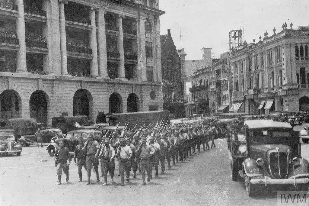 Japanese troops marching through Fullerton Square, Singapore